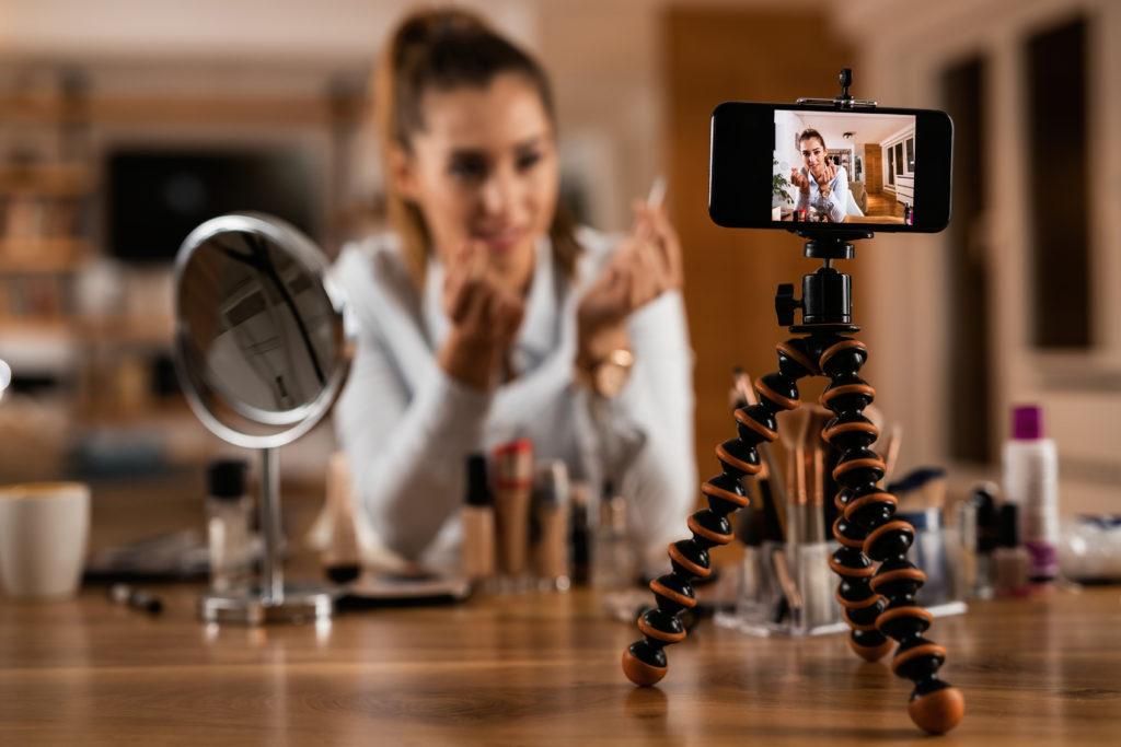 beautyvlogger 1024x683 - Close-up of make-up artist vlogging about beauty products. -